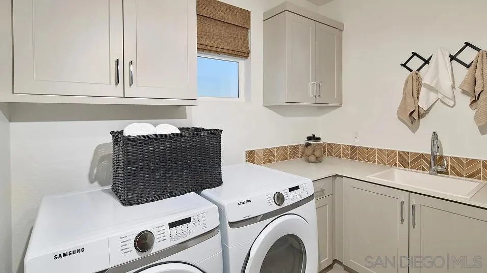 483 Gadget Road San Marcos, CA 92078 - Photo 16 of 20 a utility room with dryer and washer