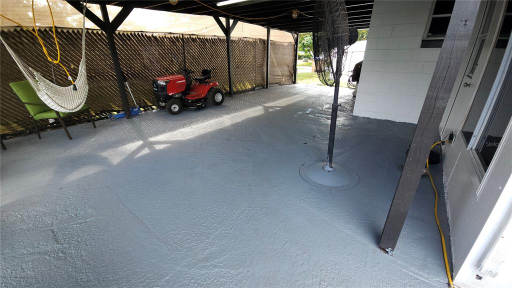 305 Gardenia Road Kissimmee, FL 34743 - Photo 20 of 28 a view of a room with cars parked