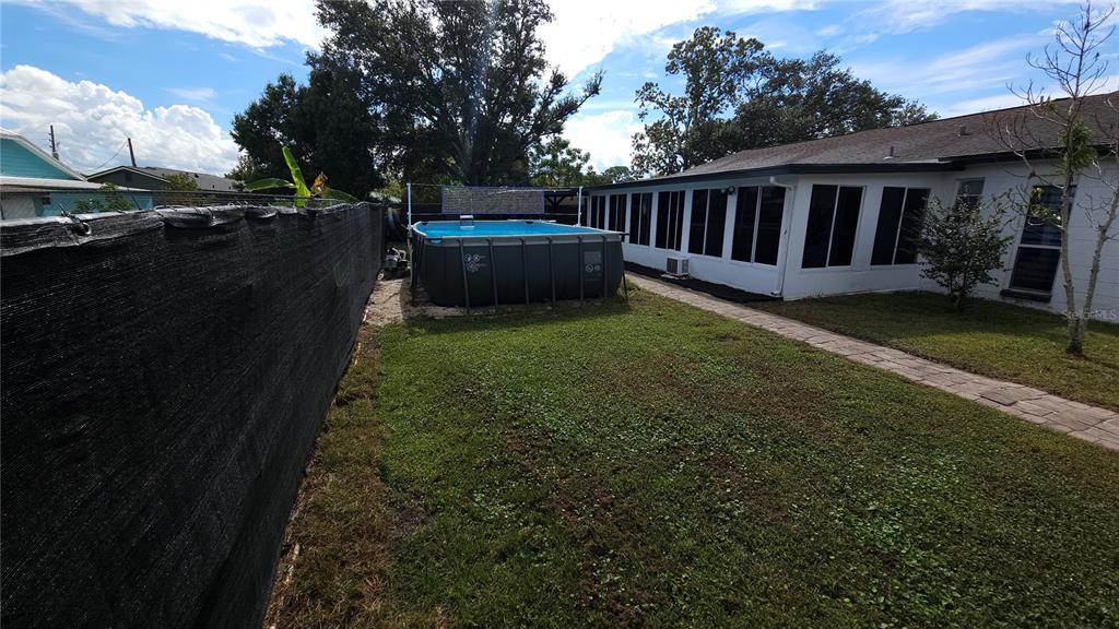 305 Gardenia Road Kissimmee, FL 34743 - Photo 28 of 28 a view of backyard with deck