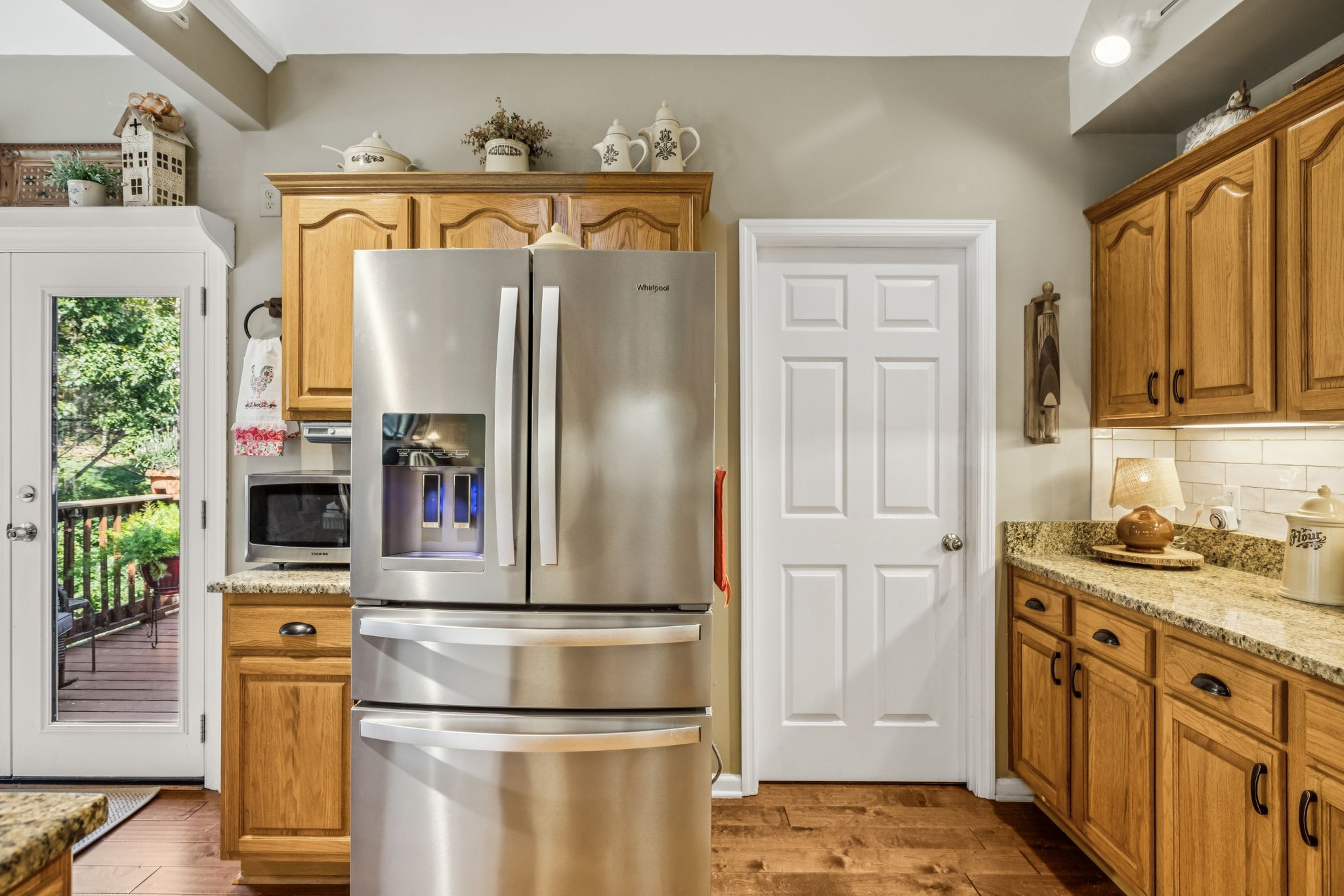 7608 Aubrey Ridge Court Fairview, TN 37062 - Photo 11 of 32 a kitchen with stainless steel appliances a refrigerator and a stove