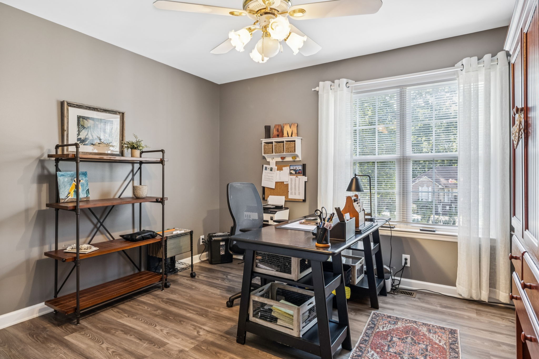 7608 Aubrey Ridge Court Fairview, TN 37062 - Photo 16 of 32 a view of a workspace with furniture and a window