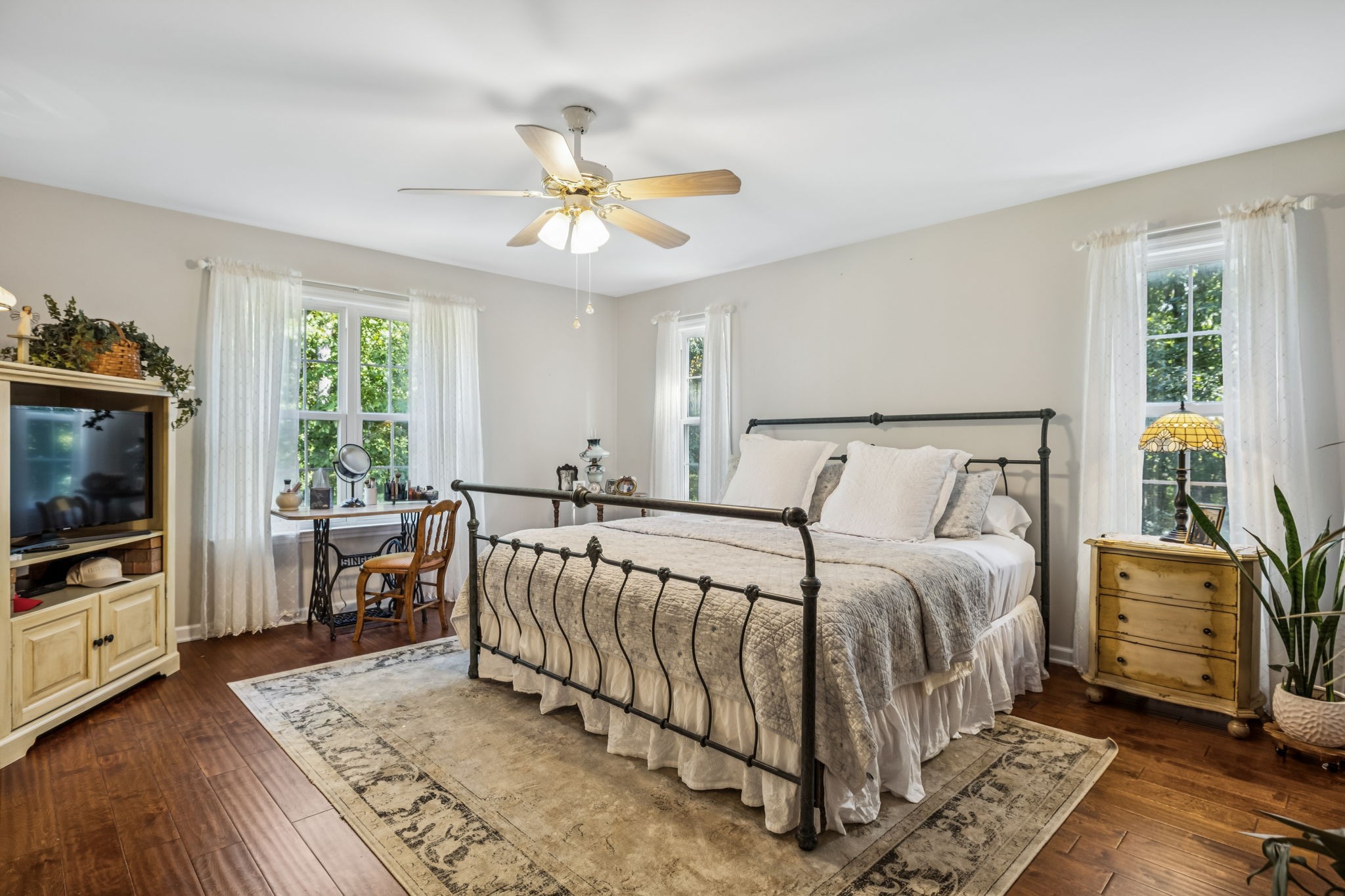 7608 Aubrey Ridge Court Fairview, TN 37062 - Photo 17 of 32 a bedroom with a bed and a flat screen tv