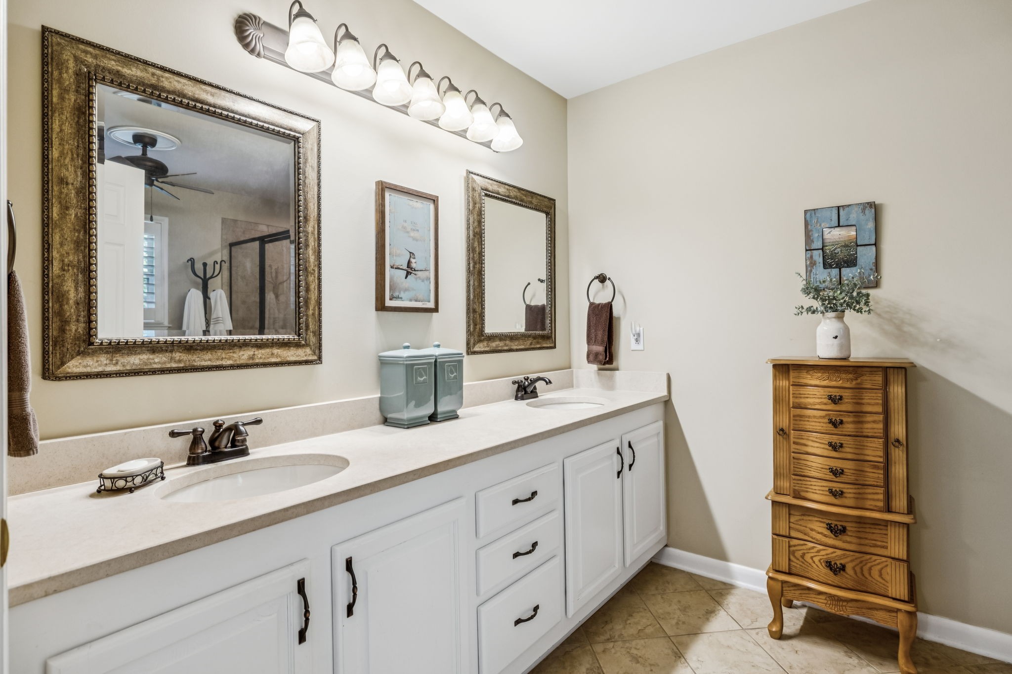 7608 Aubrey Ridge Court Fairview, TN 37062 - Photo 18 of 32 a bathroom with a double vanity sink mirror and