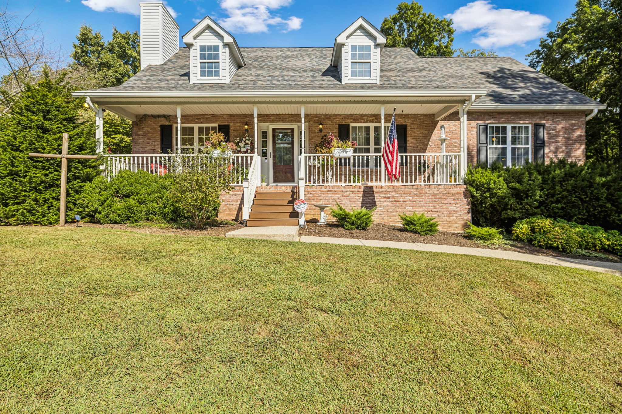7608 Aubrey Ridge Court Fairview, TN 37062 - Photo 2 of 32 a front view of a house with a yard