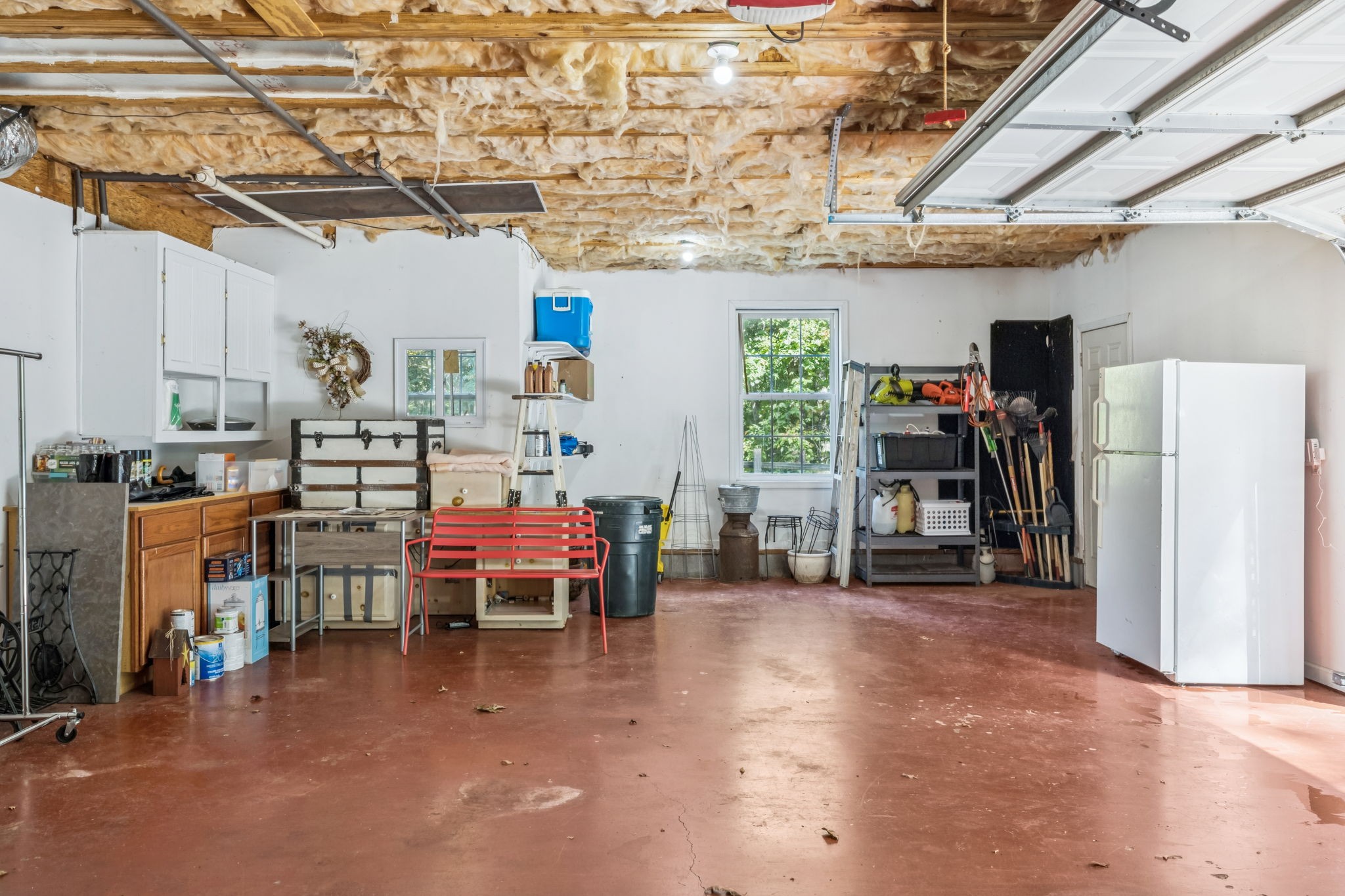 7608 Aubrey Ridge Court Fairview, TN 37062 - Photo 30 of 32 a living room with lots of furniture and a chandelier