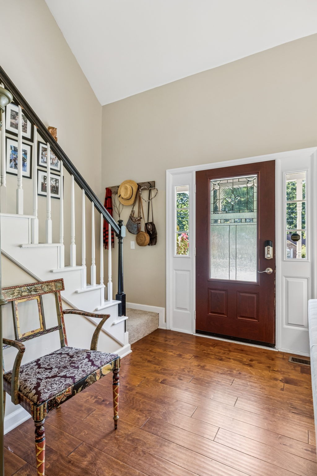 7608 Aubrey Ridge Court Fairview, TN 37062 - Photo 4 of 32 a view of an entryway with wooden floor and windows