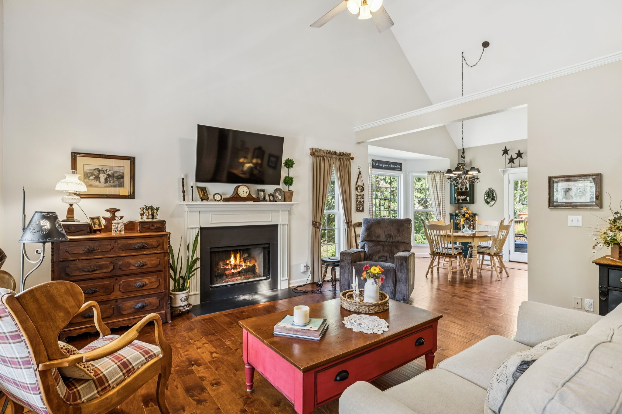 7608 Aubrey Ridge Court Fairview, TN 37062 - Photo 7 of 32 a living room with furniture a flat screen tv and a fireplace