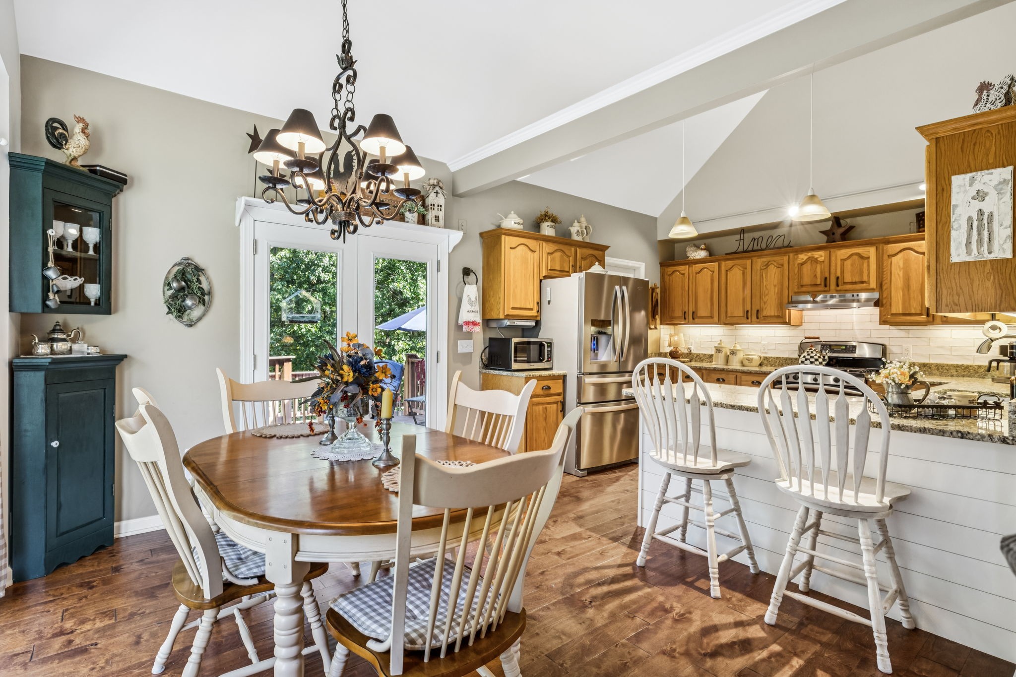 7608 Aubrey Ridge Court Fairview, TN 37062 - Photo 9 of 32 a dining room with furniture a chandelier and window