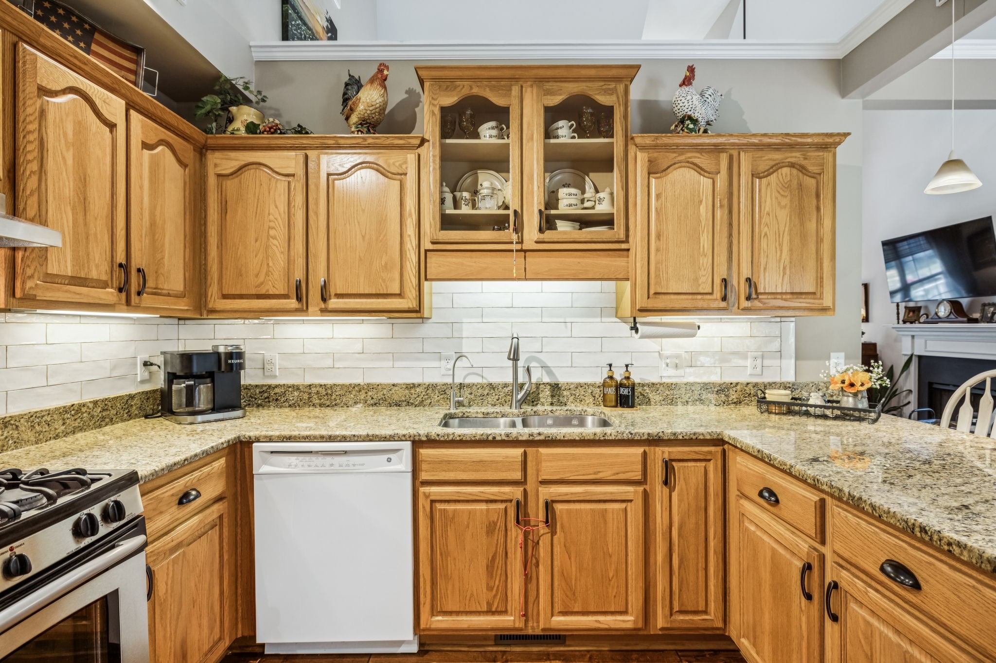 7608 Aubrey Ridge Court Fairview, TN 37062 - Photo 10 of 32 a kitchen with stainless steel appliances granite countertop a sink and cabinets