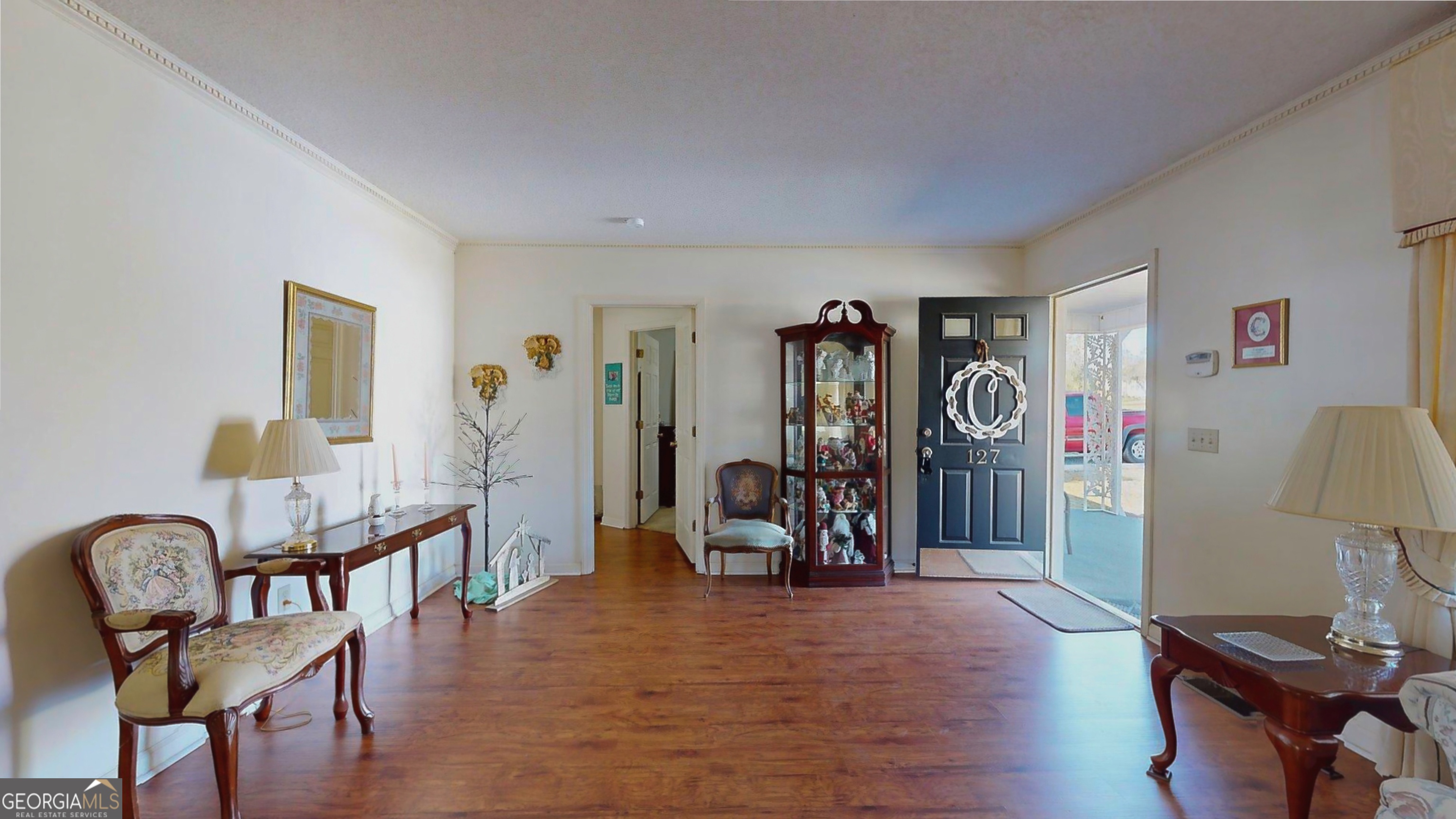 127 West Stuart Avenue Lyons, GA 30436 - Photo 44 of 71 a view of a livingroom with furniture and furniture