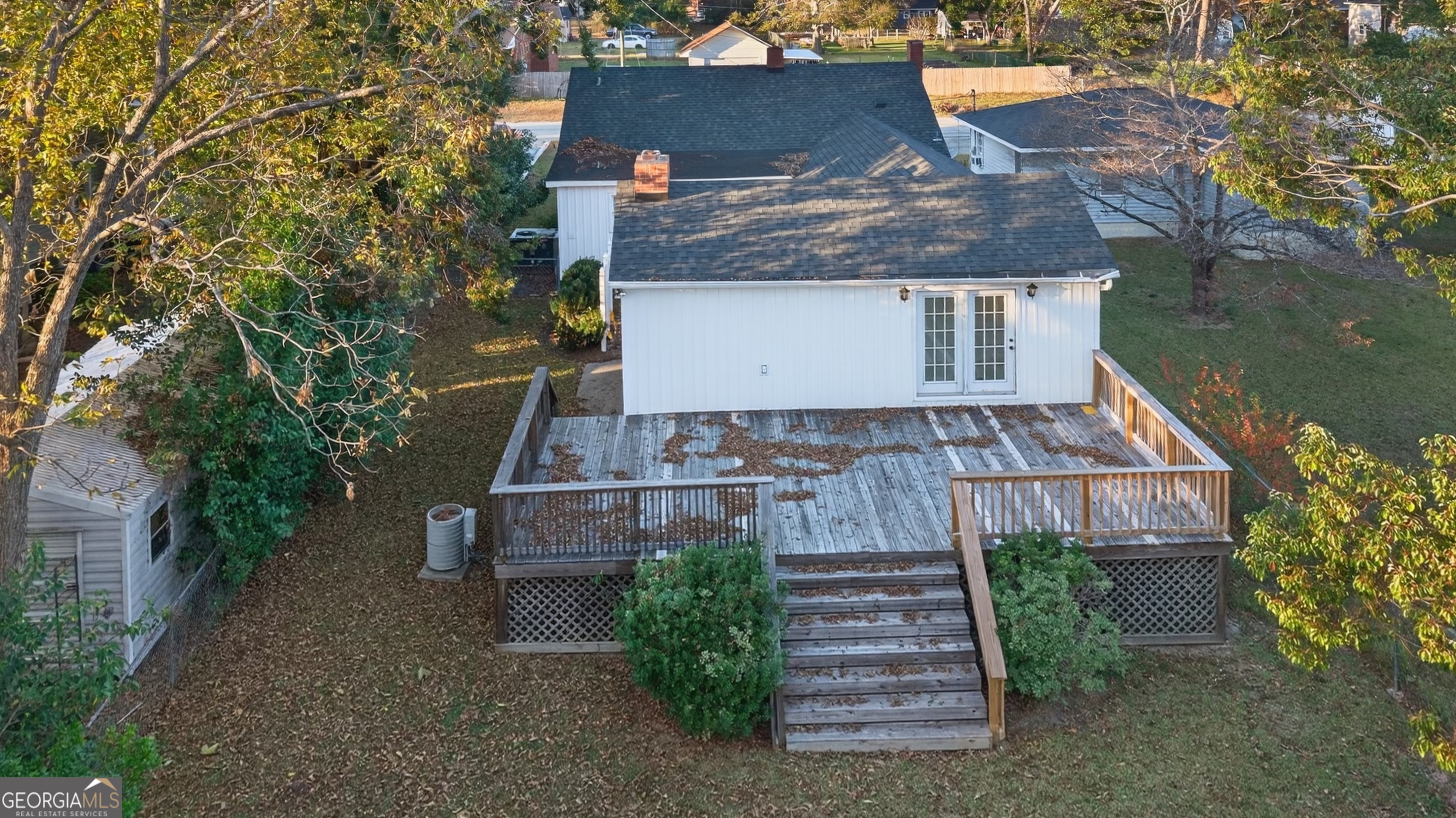 127 West Stuart Avenue Lyons, GA 30436 - Photo 6 of 71 front view of a house with a yard