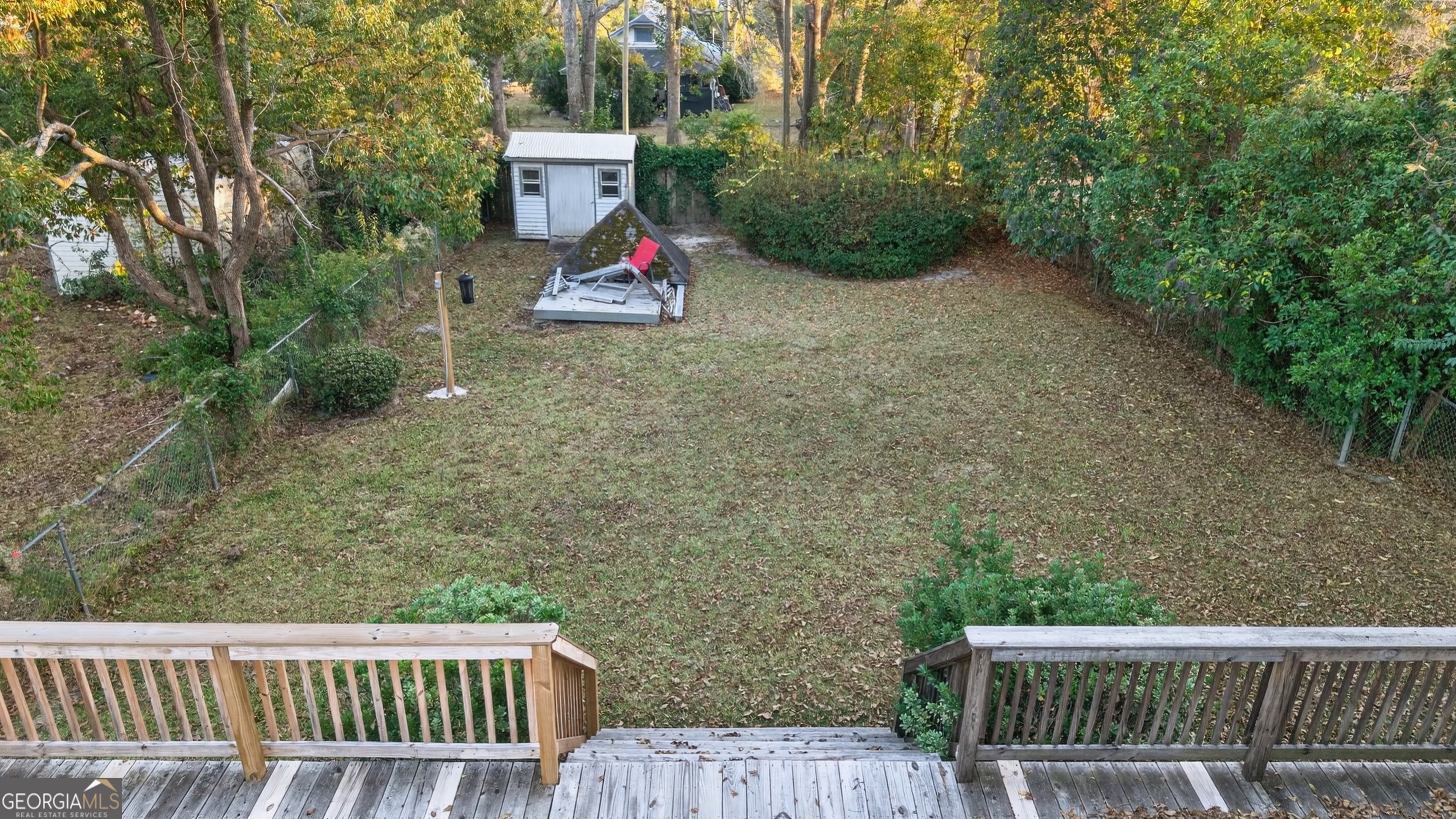 127 West Stuart Avenue Lyons, GA 30436 - Photo 8 of 71 a view of a chairs setting on the roof deck