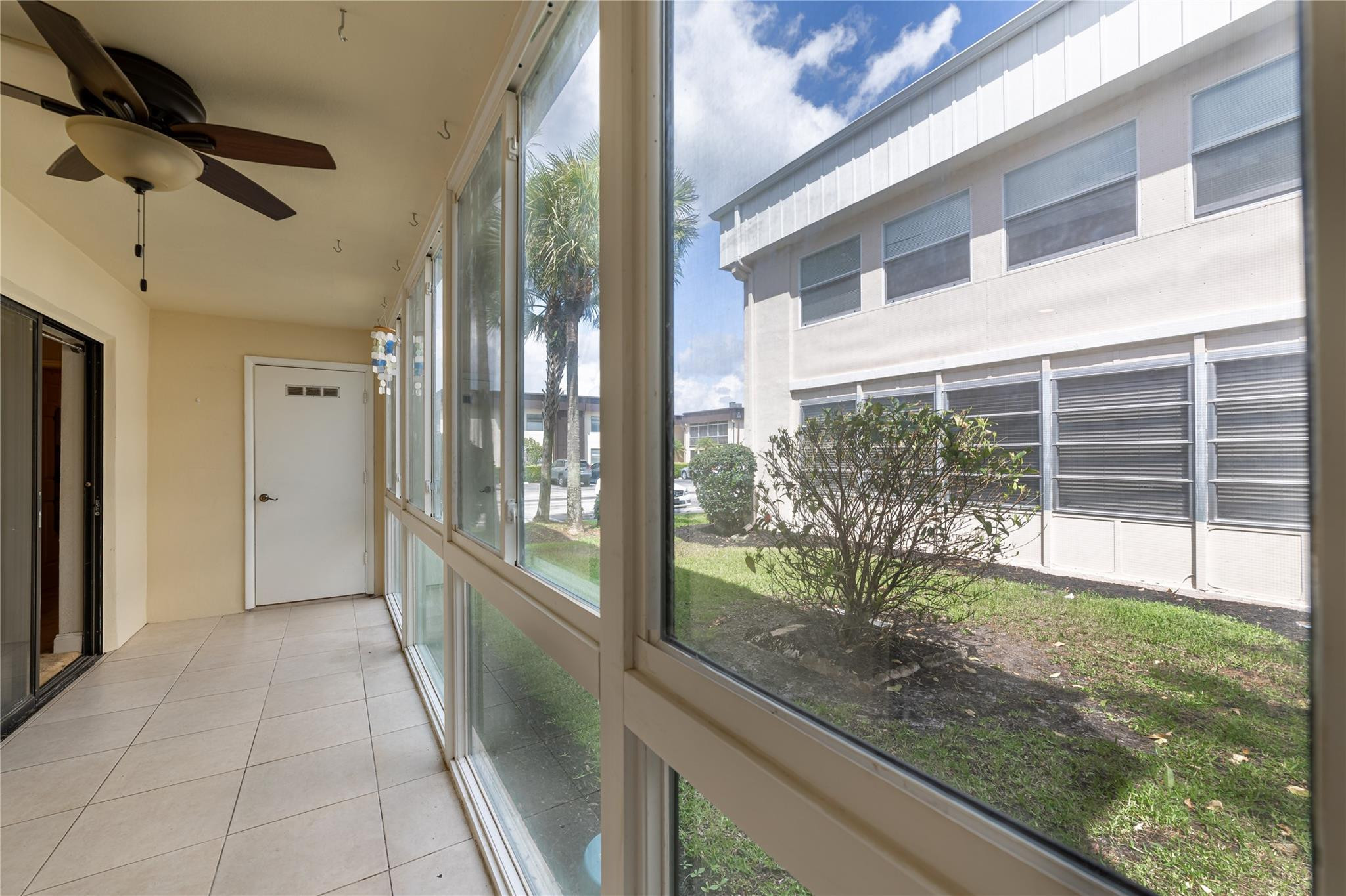 103 Capri B, Unit 103 Delray Beach, FL 33484 - Photo 12 of 24 a view of a porch