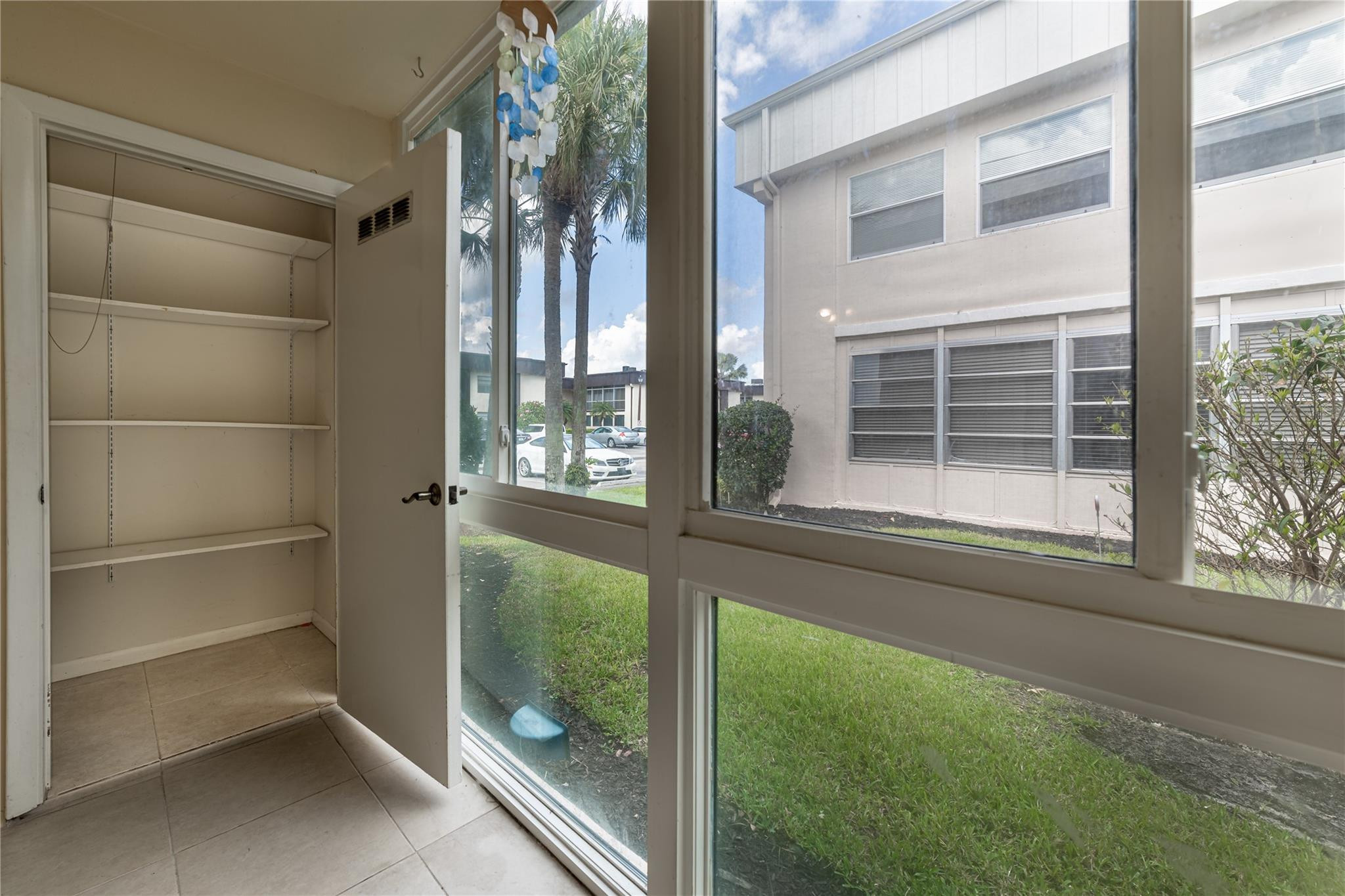 103 Capri B, Unit 103 Delray Beach, FL 33484 - Photo 20 of 24 a view of outdoor space and balcony