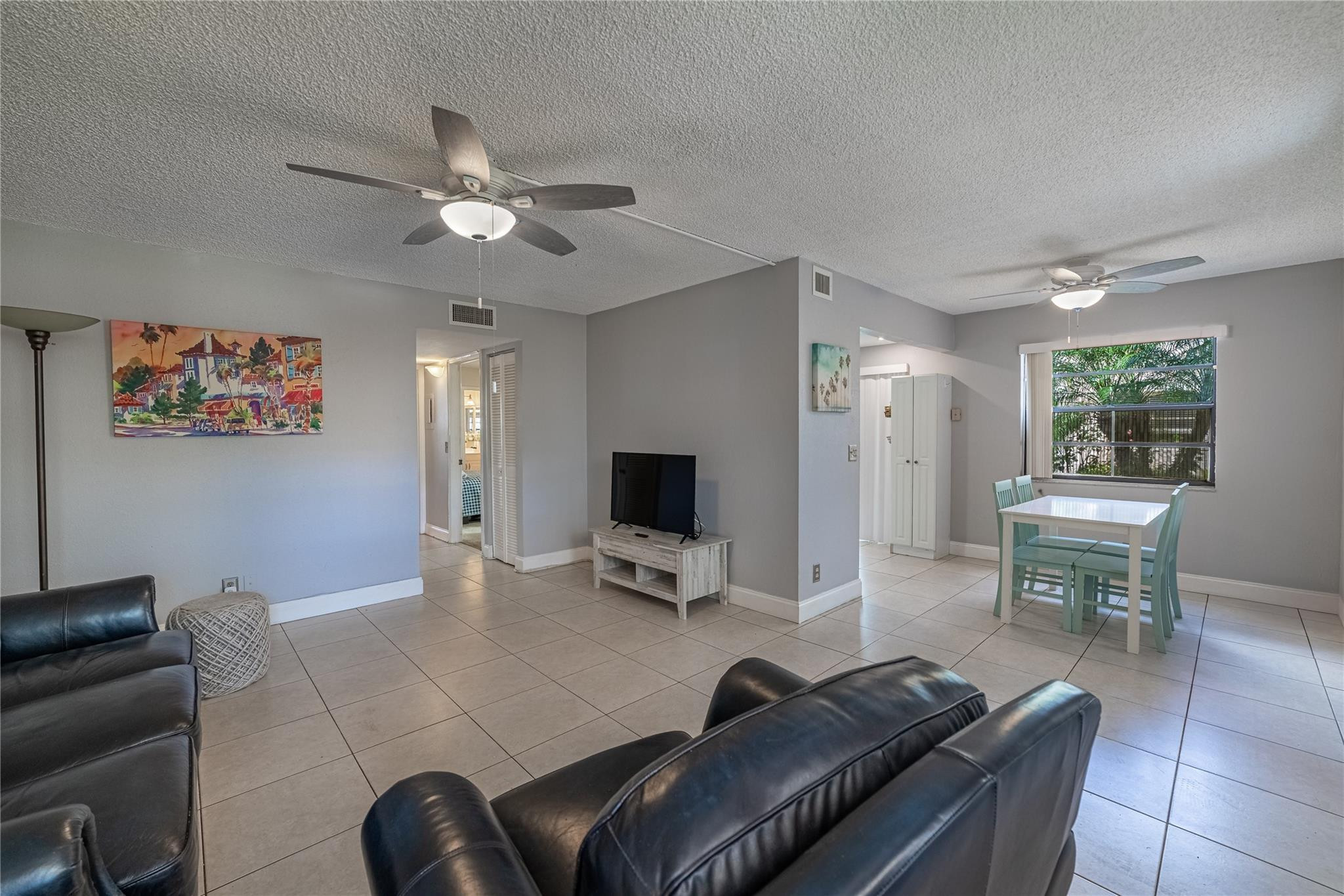 103 Capri B, Unit 103 Delray Beach, FL 33484 - Photo 8 of 24 a workspace with furniture and window