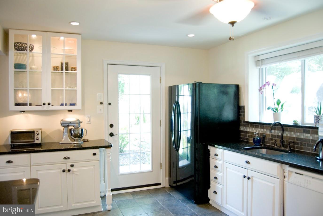 406 Private Road Woodlyn, PA 19094 - Photo 6 of 19 Kitchen with outside exit