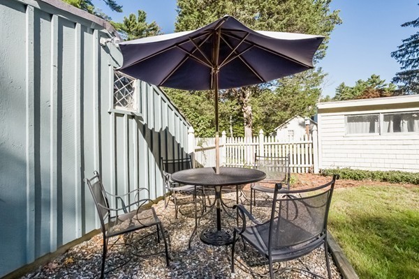 392 North Avenue Rochester, MA 02770 - Photo 16 of 18 a view of a chair and table in the balcony