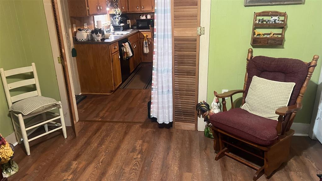413 Park Avenue Minden, LA 71055 - Photo 4 of 5 a view of a hallway with wooden floor and furniture