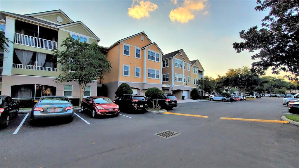 3406 Soho Street, Unit 303 Orlando, FL 32835 - Photo 19 of 19 a car parked in front of a building