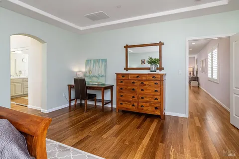a view of a livingroom with furniture and wooden floor