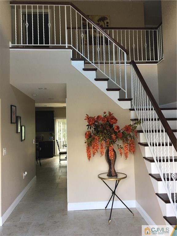 67 Ashley Road Edison, NJ 08817 - Photo 4 of 17 a view of entryway with wooden floor