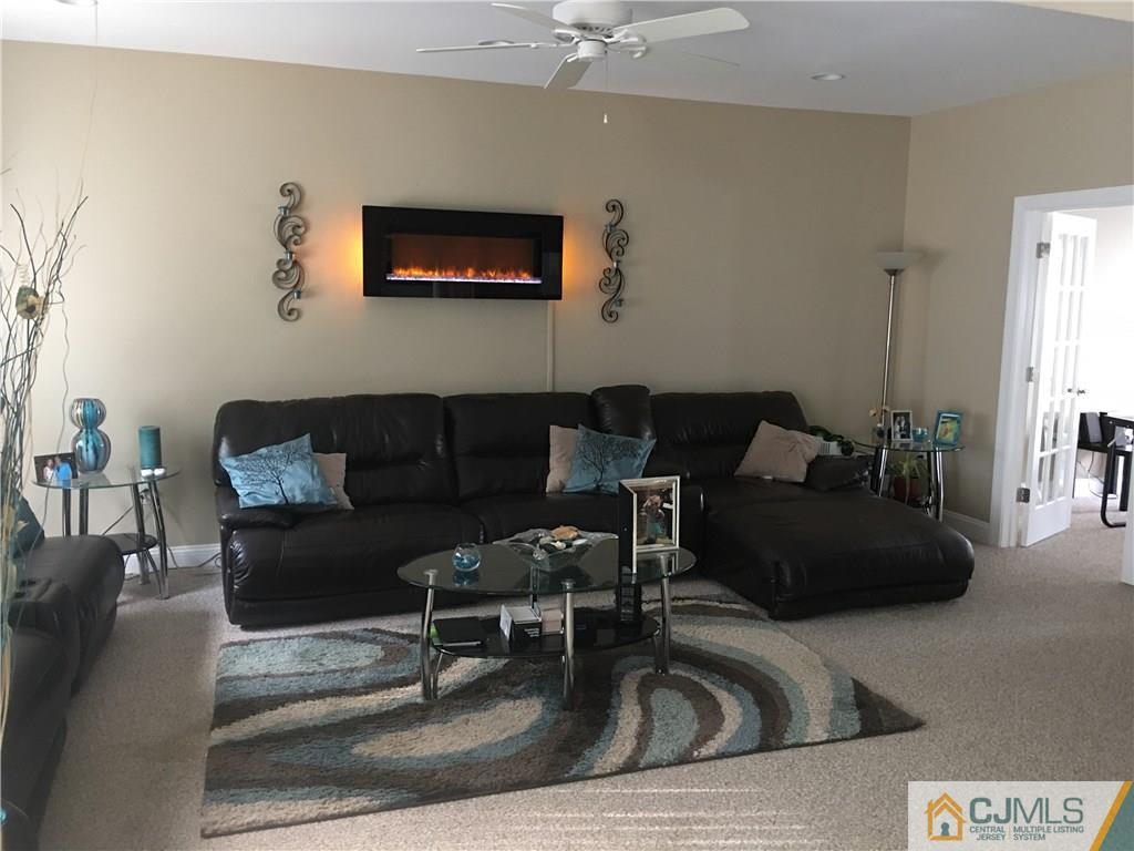 67 Ashley Road Edison, NJ 08817 - Photo 5 of 17 a living room with furniture and a couch