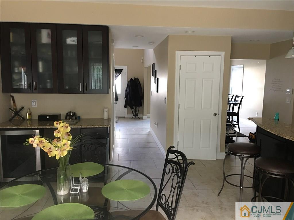67 Ashley Road Edison, NJ 08817 - Photo 6 of 17 a living room with furniture and wooden floor