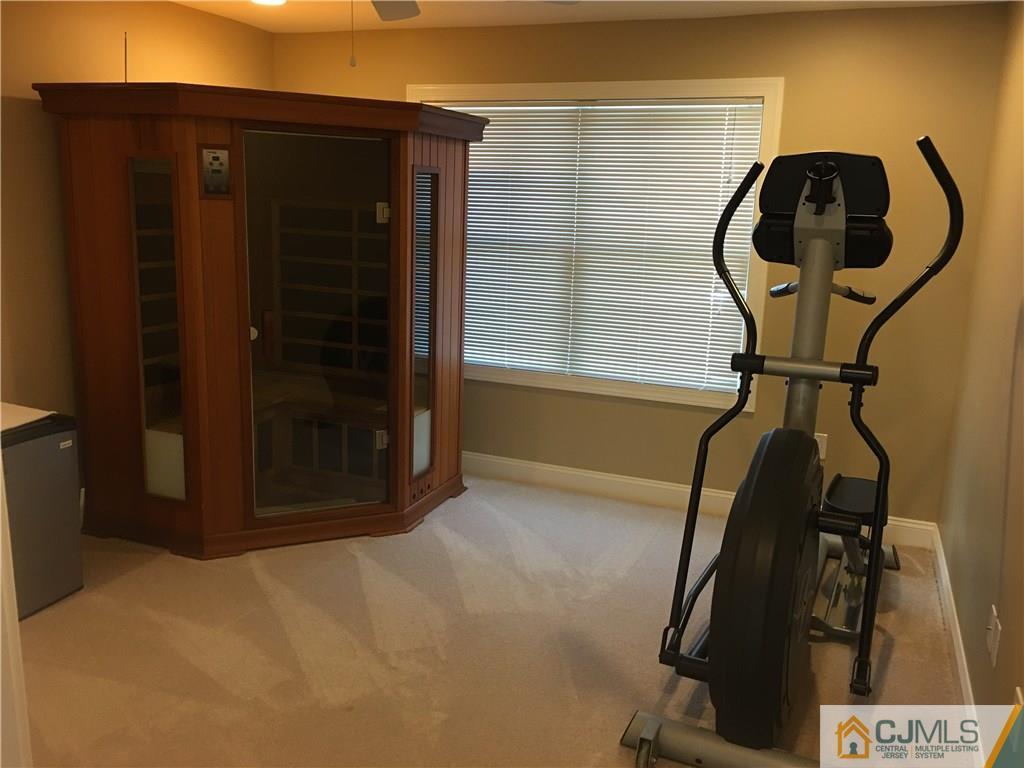 67 Ashley Road Edison, NJ 08817 - Photo 10 of 17 a view of entryway with wooden floor