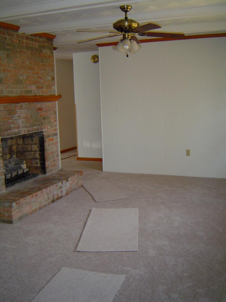 4649 Rosecrest Road Roanoke, VA 24018 - Photo 13 of 24 an empty room with a fireplace