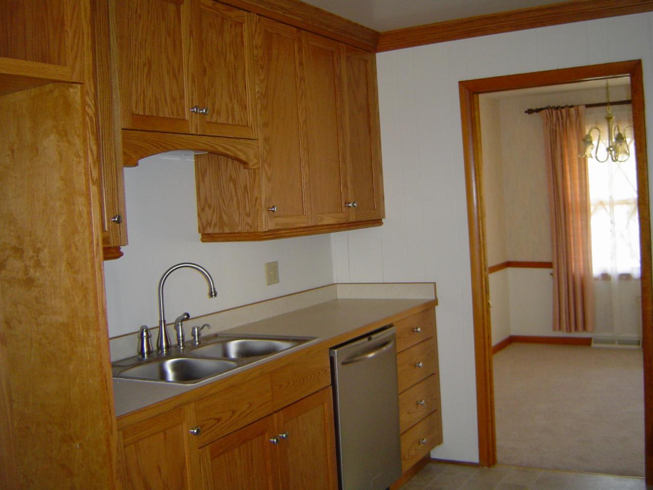 4649 Rosecrest Road Roanoke, VA 24018 - Photo 14 of 24 a kitchen with a sink and cabinets