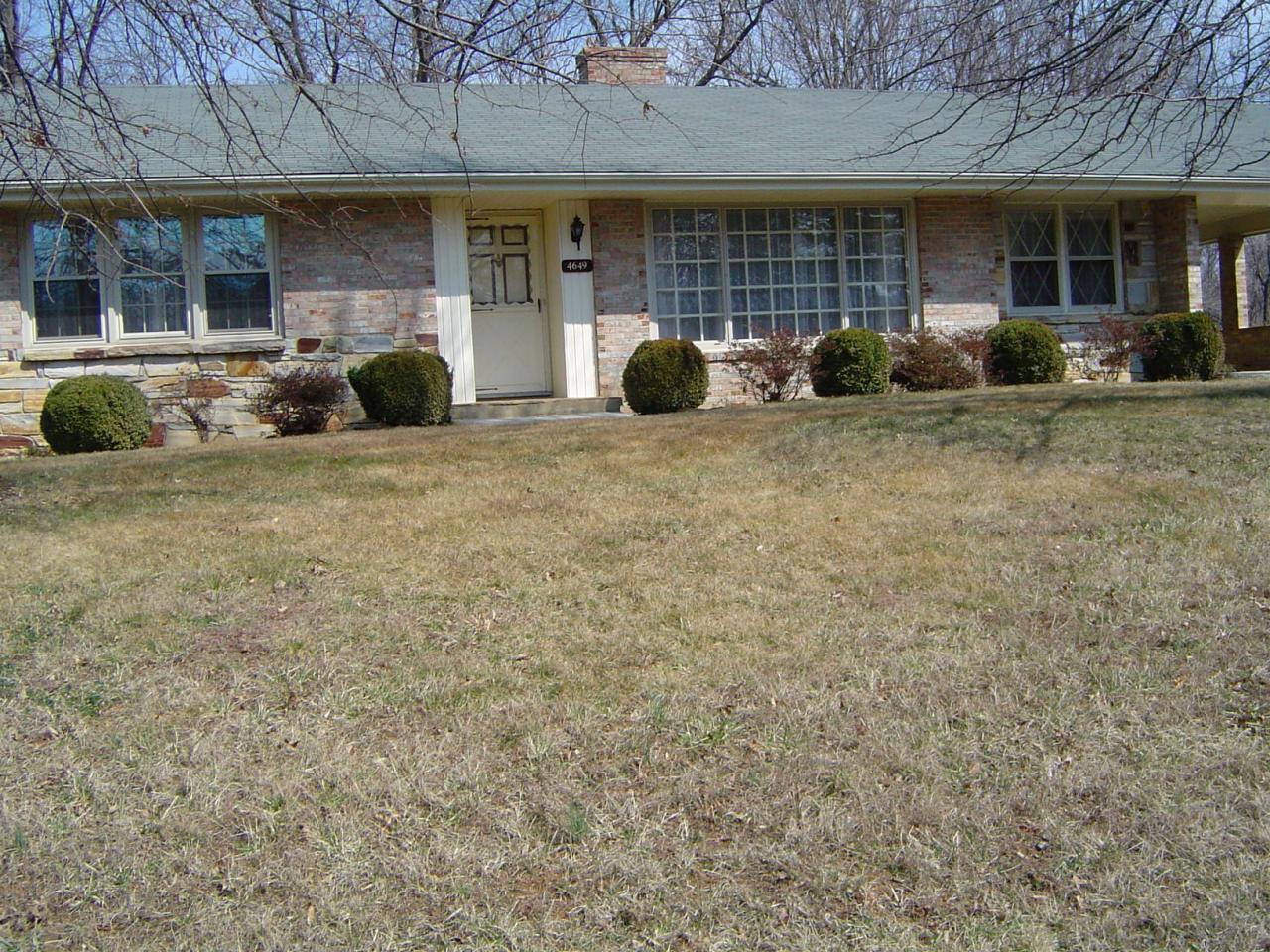 4649 Rosecrest Road Roanoke, VA 24018 - Photo 9 of 24 a front view of a house with garden and porch