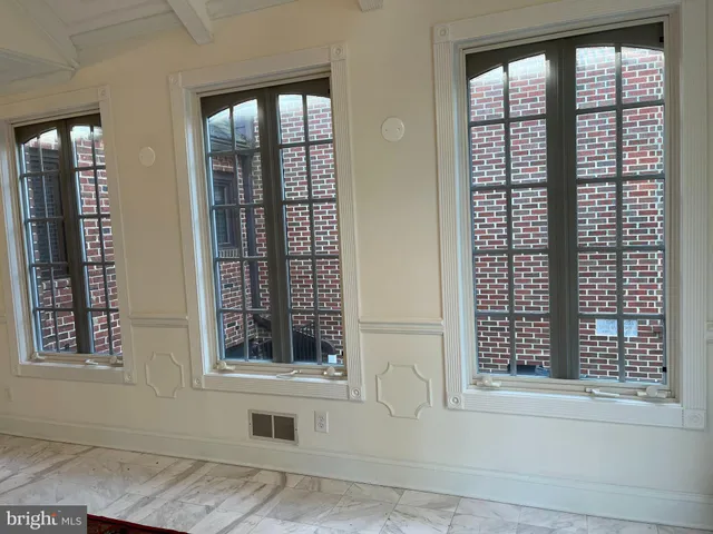 a view of an entryway with a chandelier