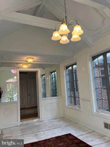 a view of a living room with a chandelier