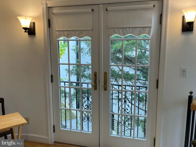 a bathroom with a sink a toilet and a shower