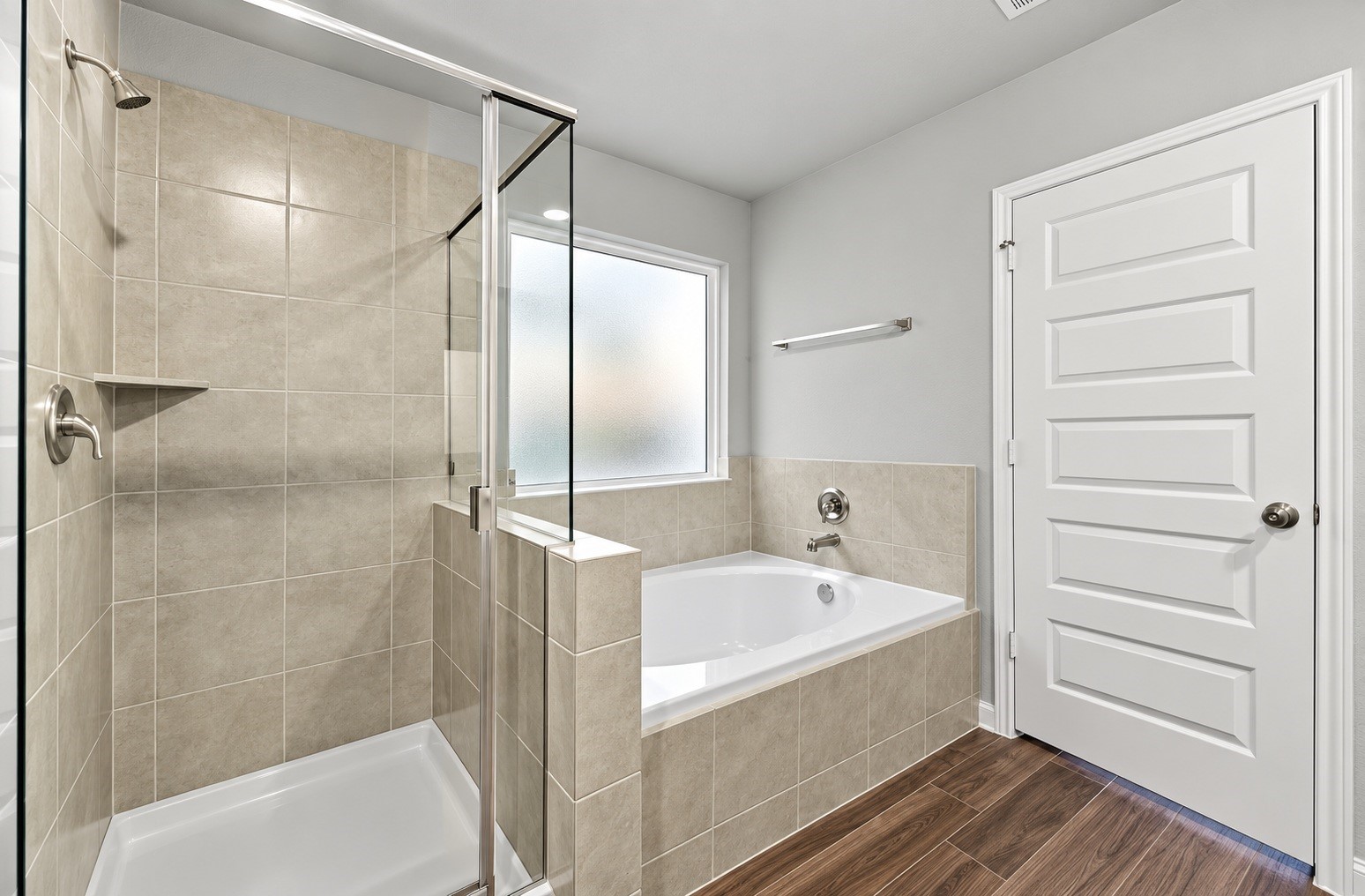 1392 Mount Blanc Path Conroe, TX 77301 - Photo 5 of 20 The ensuite bath has a luxurious soaking tub and separate shower - AI Enhanced