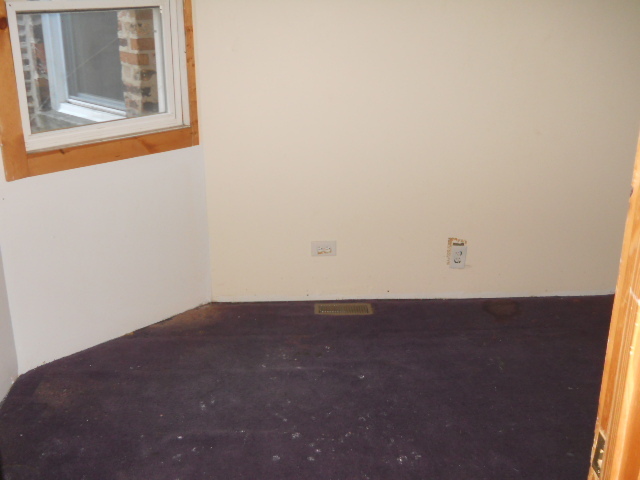 1019 West 69th Street Chicago, IL 60621 - Photo 13 of 17 a view of an empty room