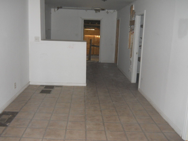 1019 West 69th Street Chicago, IL 60621 - Photo 4 of 17 a view of a hallway to rooms