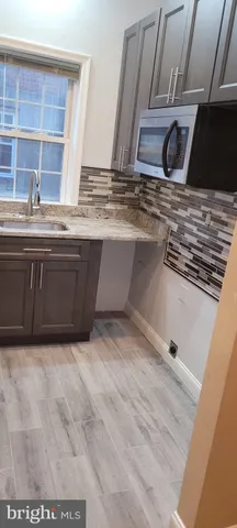 a view of cabinets and window