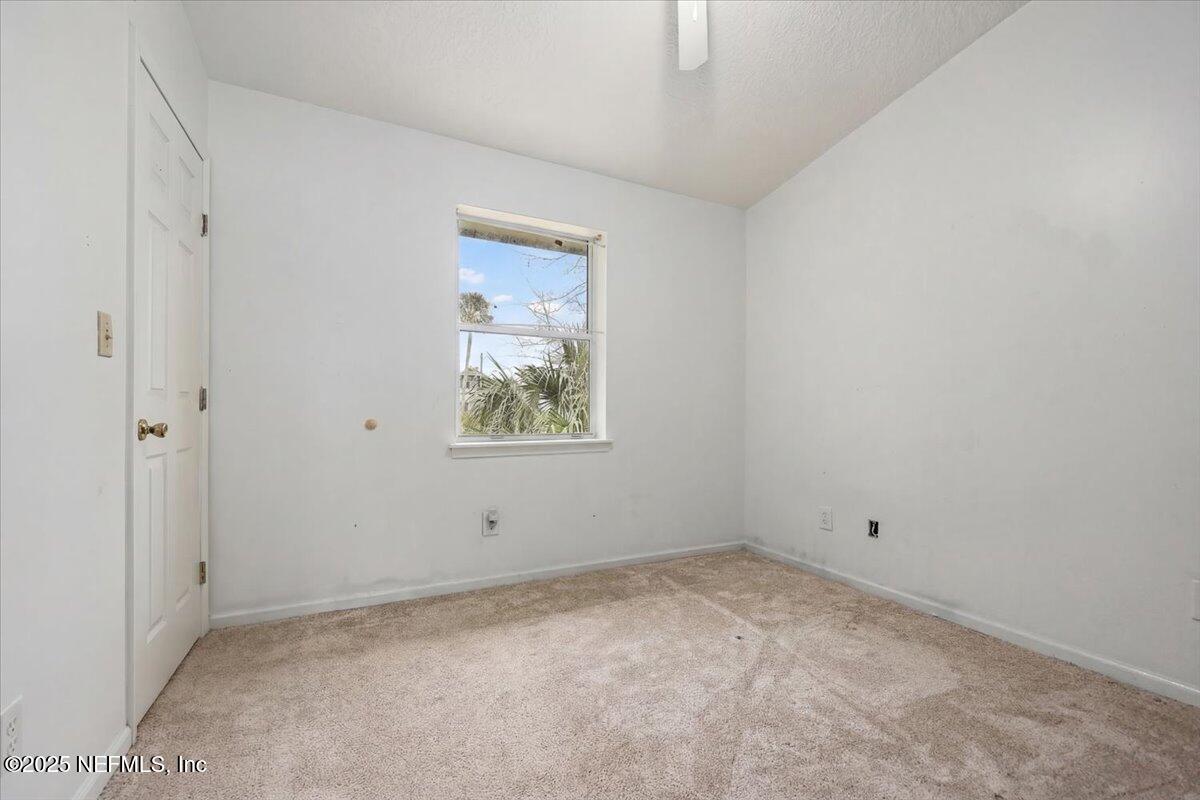 367 7th Street Atlantic Beach, FL 32233 - Photo 17 of 25 an empty room with a window
