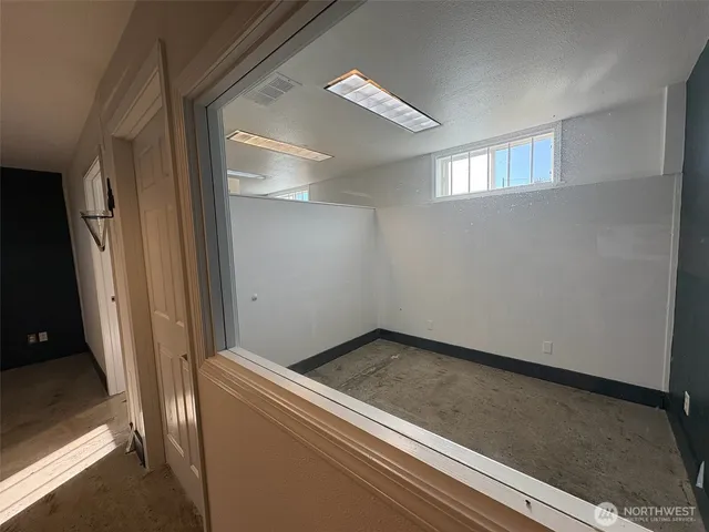 a view of small space with wooden floor