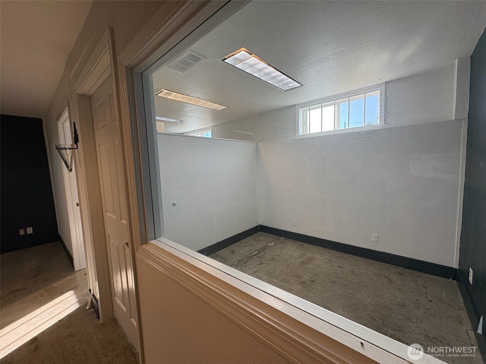 23931 Highway 99, Unit 102 Edmonds, WA 98026 - Photo 14 of 20 a view of small space with wooden floor