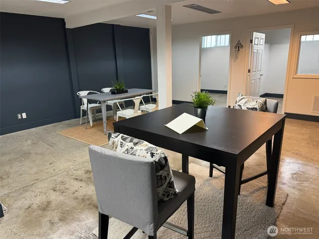 a view of a dining room with furniture