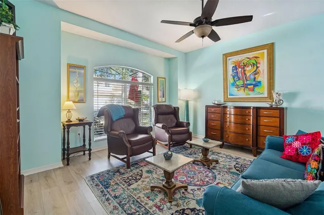 a living room with furniture and a rug