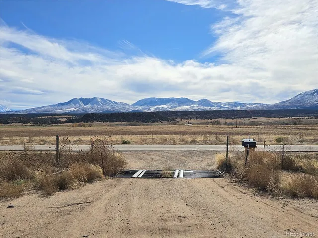 a view of a lake with a big yard