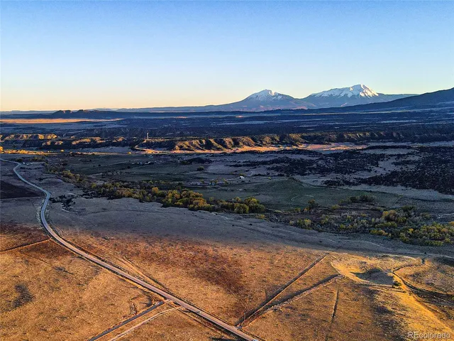a view of a street with a mountain view