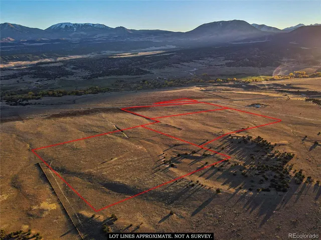 a view of an ocean and a mountain