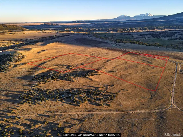 a view of an ocean and a mountain