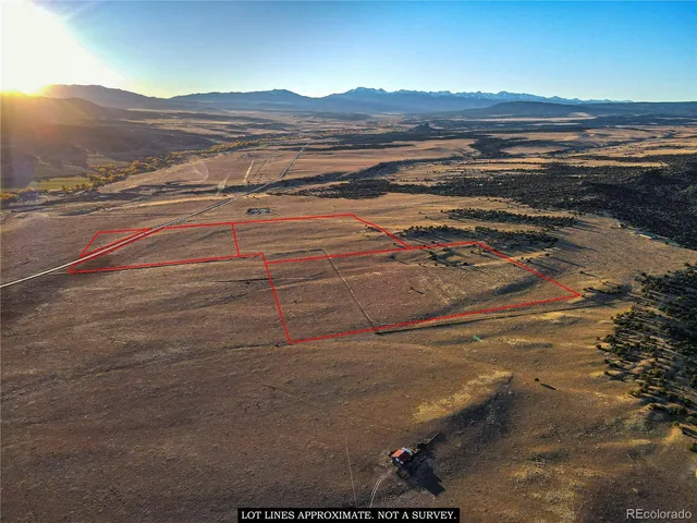 a view of an ocean and a mountain