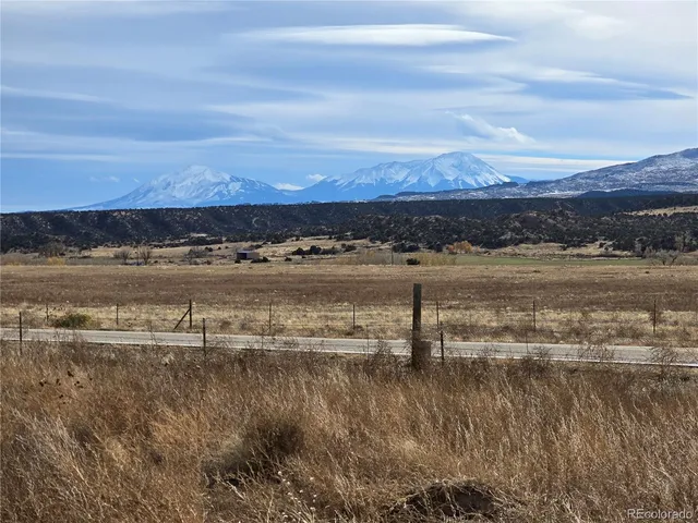 a view of an ocean and sunset