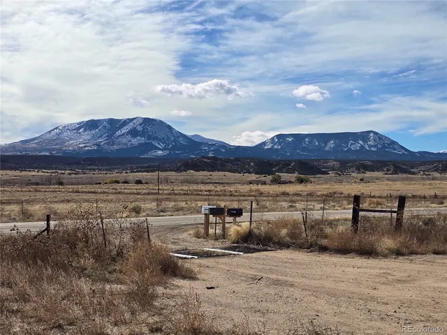 a view of a lake with a mountain in the background